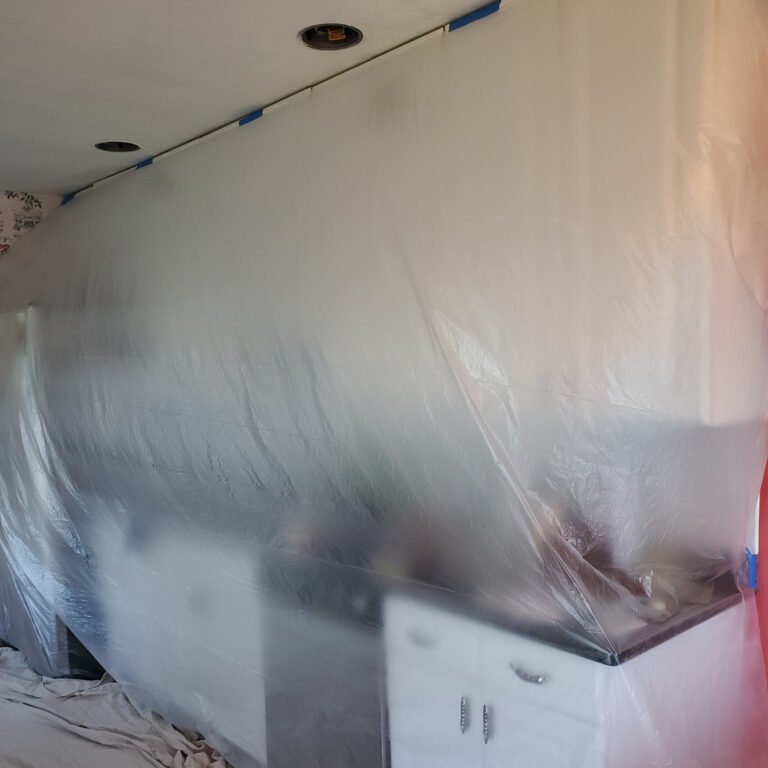 House appliances covered during painting in Salem MA